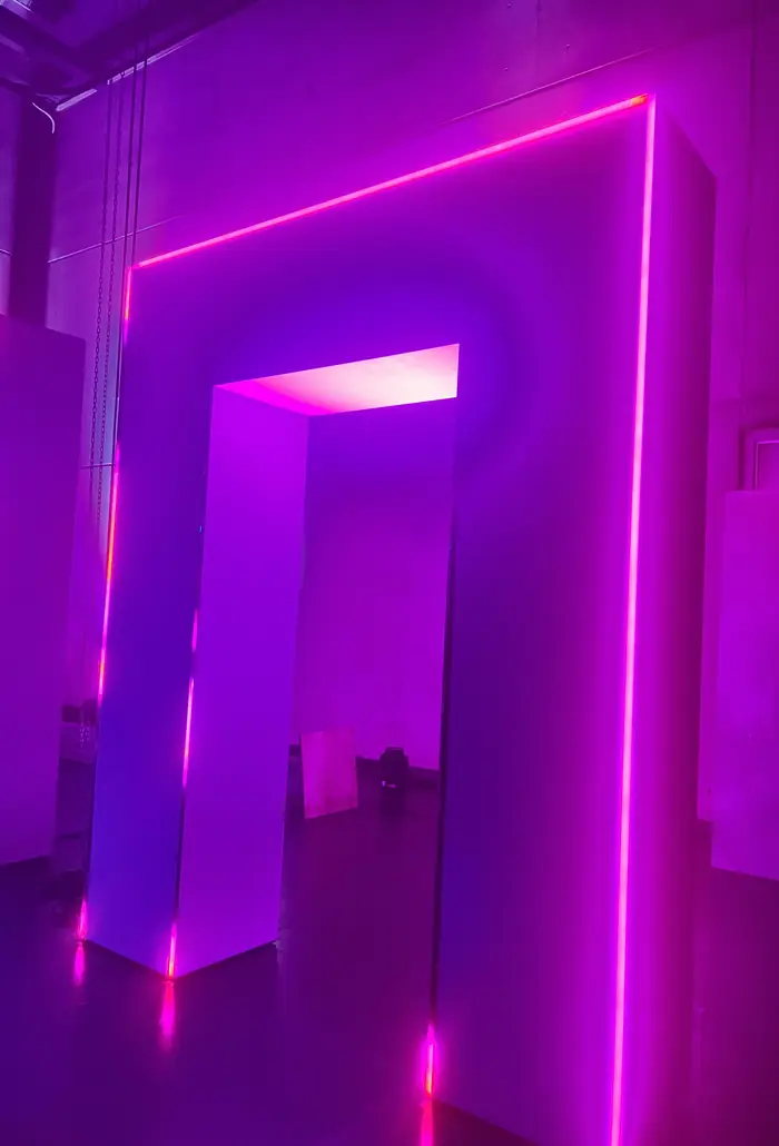Corridor set outlined in violet LED tube lighting