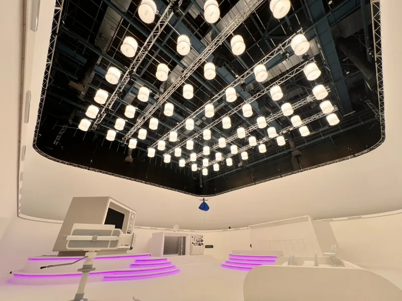 Grid of soft light sources above the white room set